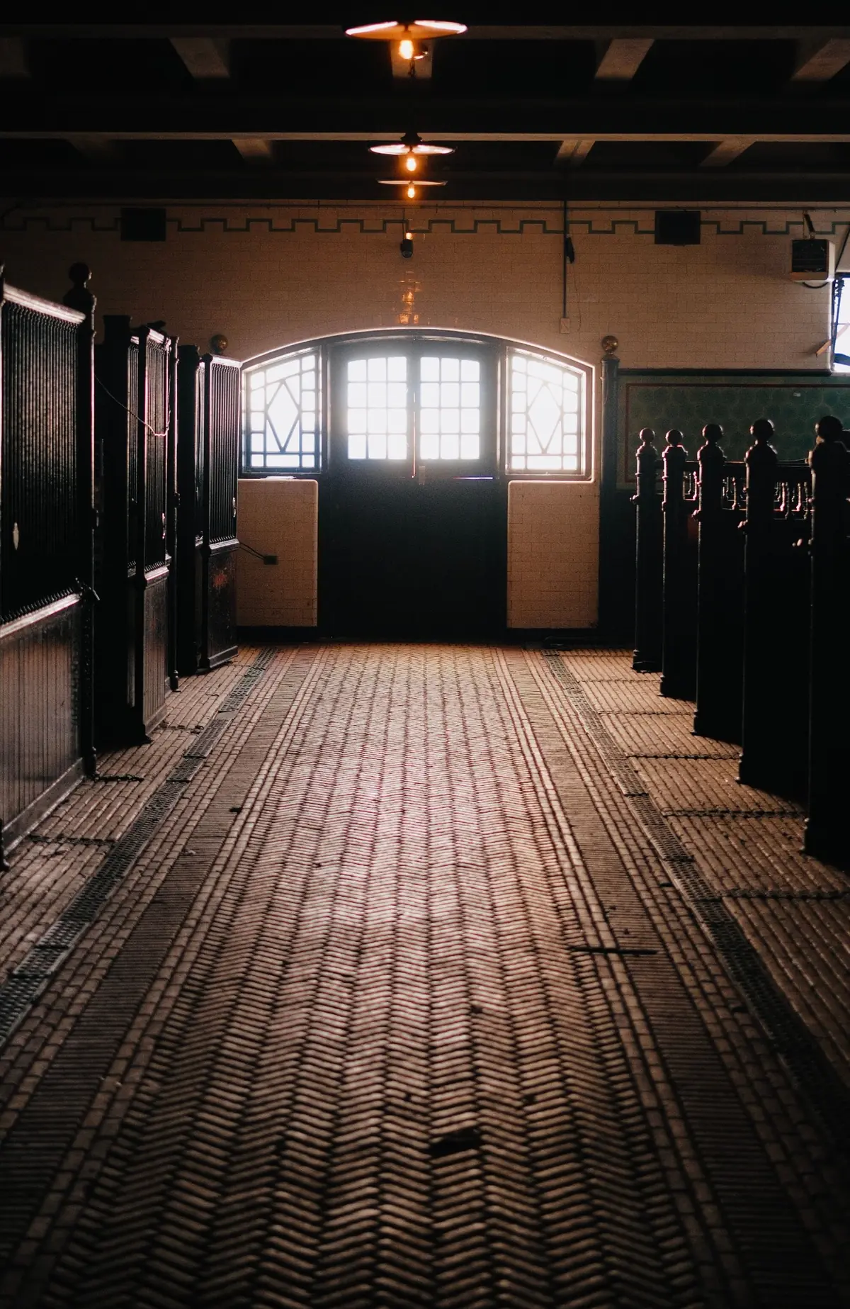 Premium stable corridor at a Noble Farms performance estate